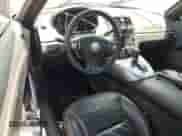 2009 Saturn Sky с VIN 1G8MN35B89Y101312, выставлен на аукционе Copart как лот 57037505 с пробегом 46 294 миль миль и Списание • Salvage title. История ставок и продаж доступна на DreamBid. Изображение 8.