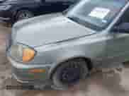 2003 Hyundai Accent GL z VIN KMHCG45C83U477254, wystawiony jako IAAI lot #42621015 z przebiegiem 71 966 mil mil oraz . Historia ofert i sprzedaży dostępna na DreamBid. Obrazek 6.