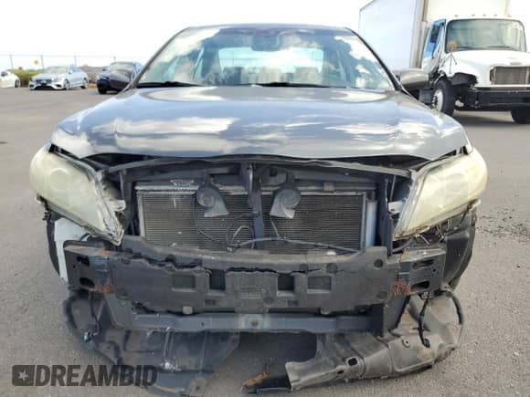 2007 Toyota Camry LE z VIN 4T1BK46K67U505462, wystawiony jako Copart lot #69739655 z przebiegiem 82 517 mil mil oraz Szkoda całkowita • Salvage title. Historia ofert i sprzedaży dostępna na DreamBid. Obrazek 5.