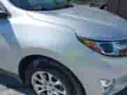 2018 Chevrolet Equinox LT z VIN 2GNAXSEV7J6311280, wystawiony jako IAAI lot #43268032 z przebiegiem 87 427 mil mil oraz . Historia ofert i sprzedaży dostępna na DreamBid. Obrazek 12.