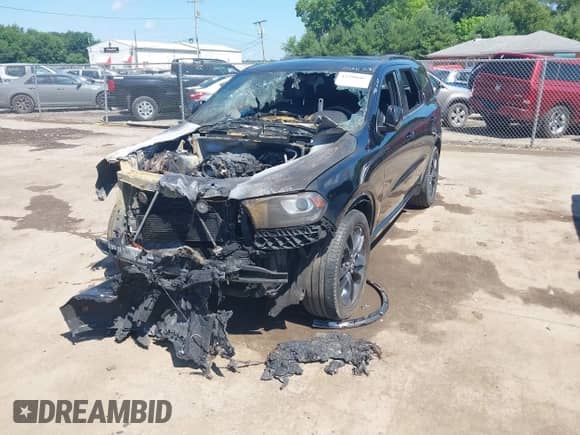 2020 Dodge Durango R/T with VIN 1C4SDJCT8LC413246, listed as a IAAI auction lot 42590605 with 67,231 mi miles and . Bid and sale history available at DreamBid. Image 2.