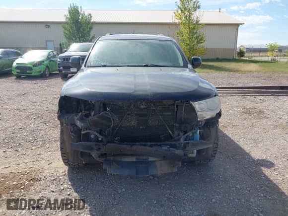 2013 Dodge Durango SXT with VIN 1C4RDJAG4DC576806, listed as a IAAI auction lot 43175682 with 207,340 mi miles and . Bid and sale history available at DreamBid. Image 12.