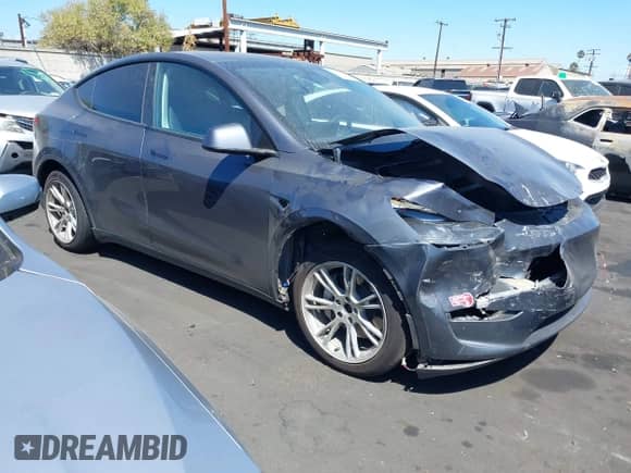 2023 Tesla Model Y Long Range with VIN 7SAYGDEE5PF865572, listed as a IAAI auction lot 43067262 with 56,508 mi miles and . Bid and sale history available at DreamBid. Image 1.