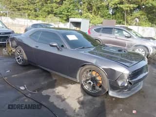 2016 Dodge Challenger R/T Plus Shaker z VIN 2C3CDZBTXGH300653, wystawiony jako IAAI lot #43344003 z przebiegiem 62 594 mil mil oraz . Historia ofert i sprzedaży dostępna na DreamBid. Obrazek 1.