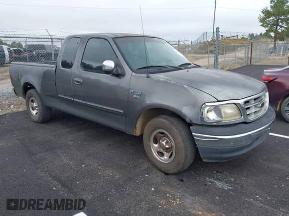 2002 Ford F-150 XL with VIN 2FTRX17L22CA34476, listed as a IAAI auction lot 43390303 with 237,458 mi miles and . Bid and sale history available at DreamBid. Image 1.