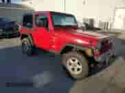 2000 Jeep Wrangler Sport z VIN 1J4FA49SXYP768858, wystawiony jako Copart lot #72104145 z przebiegiem 228 361 mil mil oraz Szkoda całkowita • Salvage title. Historia ofert i sprzedaży dostępna na DreamBid. Obrazek 4.