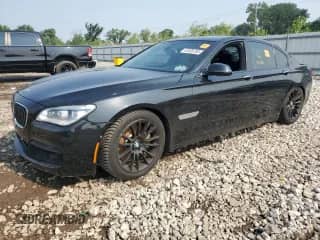 2015 BMW 7 Series 750i xDrive с VIN WBAYB6C56FD225478, выставлен на аукционе Copart как лот 67035785 с пробегом 130 037 миль миль и Списание • Salvage title. История ставок и продаж доступна на DreamBid. Изображение 1.