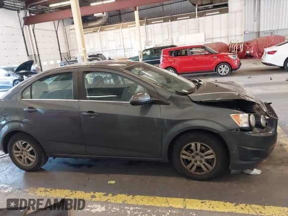 2012 Chevrolet Sonic LT with VIN 1G1JC5SB3C4168812, listed as a IAAI auction lot 42748632 with 130,949 mi miles and . Bid and sale history available at DreamBid. Image 14.
