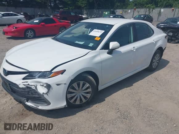 2022 Toyota Camry Hybrid LE with VIN 4T1C31AK2NU591549, listed as a IAAI auction lot 42499072 with 55,882 mi miles and . Bid and sale history available at DreamBid. Image 22.