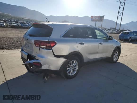 2020 Kia Sorento LX с VIN 5XYPGDA59LG613003, выставлен на аукционе Copart как лот 82104095 с пробегом 104 257 миль миль и Списание • Salvage title. История ставок и продаж доступна на DreamBid. Изображение 3.