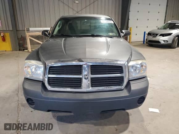 2006 Dodge Dakota z VIN 1D7HW22N46S715954, wystawiony jako Copart lot #68994315 z przebiegiem 87 989 mil mil oraz Czysty tytuł • Clean title. Historia ofert i sprzedaży dostępna na DreamBid. Obrazek 5.