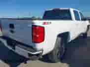 2018 Chevrolet Silverado 1500 LT with VIN 1GCUKRECXJF180945, listed as a IAAI auction lot 42450588 with 108,199 mi miles and . Bid and sale history available at DreamBid. Image 4.