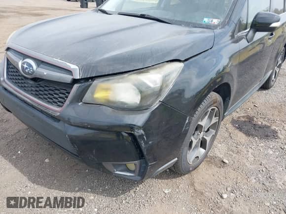 2014 Subaru Forester XT Touring z VIN JF2SJGMC1EH405328, wystawiony jako IAAI lot #43177698 z przebiegiem 156 351 mil mil oraz . Historia ofert i sprzedaży dostępna na DreamBid. Obrazek 6.