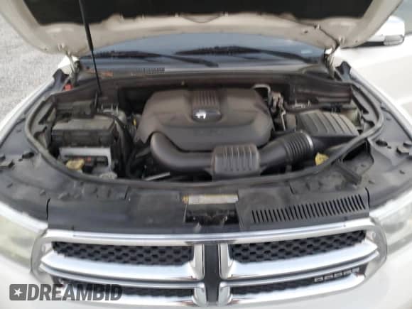 2011 Dodge Durango Crew с VIN 1D4RD4GG7BC704870, выставлен на аукционе Copart как лот 82209905 с пробегом 217 403 миль миль и Списание • Salvage title. История ставок и продаж доступна на DreamBid. Изображение 12.