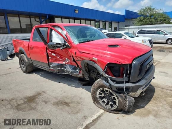 2016 Ram 1500 Rebel с VIN 1C6RR7YT2GS369307, выставлен на аукционе Copart как лот 61377595 с пробегом 154 409 миль миль и На запчасти • Non repairable. История ставок и продаж доступна на DreamBid. Изображение 4.