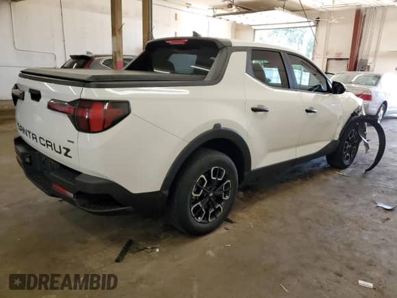 2022 Hyundai Santa Cruz SE с VIN 5NTJADAE2NH010656, выставлен на аукционе Copart как лот 66672185 с пробегом 57 802 миль миль и Списание • Salvage title. История ставок и продаж доступна на DreamBid. Изображение 3.