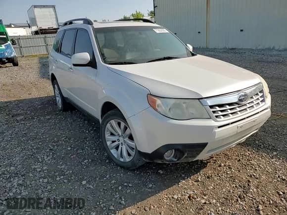 2012 Subaru Forester X Limited z VIN JF2SHBEC2CH411665, wystawiony jako Copart lot #71602505 z przebiegiem 158 584 mil mil oraz Szkoda całkowita • Salvage title. Historia ofert i sprzedaży dostępna na DreamBid. Obrazek 14.