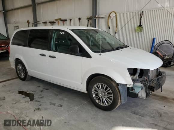 2019 Dodge Grand Caravan SE 35th Anniversary Edition with VIN 2C4RDGBG2KR780574, listed as a Copart auction lot 84587175 with 125,746 mi miles and Salvage title. Bid and sale history available at DreamBid. Image 4.