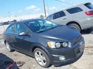 2014 Chevrolet Sonic LTZ with VIN 1G1JE5SB5E4225055, listed as a IAAI auction lot 42841720 with 141,716 mi miles and . Bid and sale history available at DreamBid. Image 1.