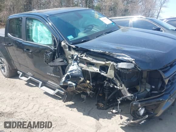 2021 Chevrolet Colorado 4WD Z71 z VIN 1GCGTDEN9M1156622, wystawiony jako IAAI lot #42065075 z przebiegiem 61 438 mil mil oraz . Historia ofert i sprzedaży dostępna na DreamBid. Obrazek 6.