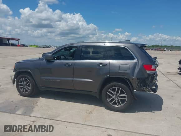 2019 Jeep Grand Cherokee Altitude with VIN 1C4RJEAG4KC790028, listed as a IAAI auction lot 42909506 with 110,719 mi miles and . Bid and sale history available at DreamBid. Image 14.
