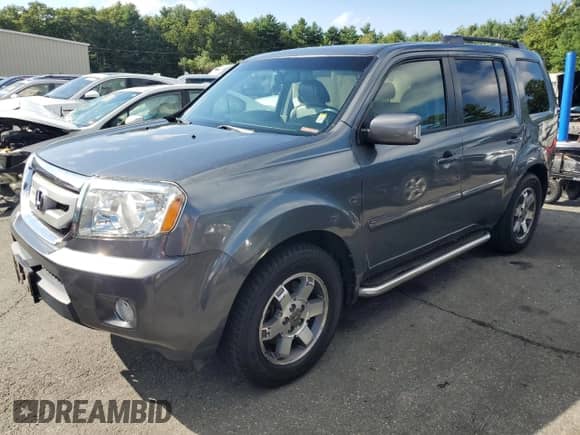 2010 Honda Pilot Touring with VIN 5FNYF4H9XAB005981, listed as a Copart auction lot 71617615 with 183,441 mi miles and Salvage title. Bid and sale history available at DreamBid. Image 1.