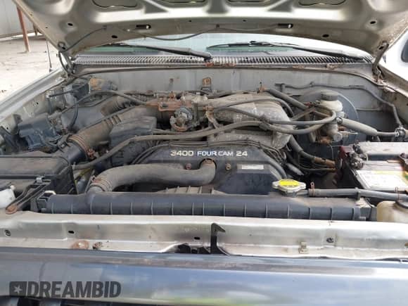 2002 Toyota Tacoma z VIN 5TEWN72N12Z127288, wystawiony jako IAAI lot #43390099 z przebiegiem 249 449 mil mil oraz . Historia ofert i sprzedaży dostępna na DreamBid. Obrazek 10.