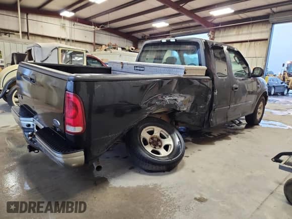 2003 Ford F-150 XL with VIN 2FTRX172X3CA42415, listed as a Copart auction lot 70556985 with 227,798 mi miles and Clean title. Bid and sale history available at DreamBid. Image 3.