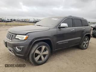 2016 Jeep Grand Cherokee High Altitude with VIN 1C4RJECG4GC314575, listed as a Copart auction lot 84265744 with 129,144 mi miles and Salvage title. Bid and sale history available at DreamBid. Image 1.