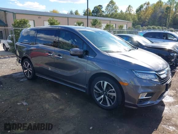 2018 Honda Odyssey Elite z VIN 5FNRL6H91JB071957, wystawiony jako IAAI lot #43506915 z przebiegiem 75 656 mil mil oraz . Historia ofert i sprzedaży dostępna na DreamBid. Obrazek 1.