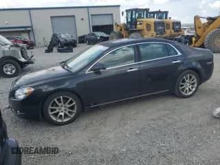2009 Chevrolet Malibu LTZ with VIN 1G1ZK577X94229060, listed as a Copart auction lot 68033845 with 148,376 mi miles and Salvage title. Bid and sale history available at DreamBid. Image 1.