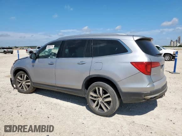 2018 Honda Pilot Touring с VIN 5FNYF5H94JB020448, выставлен на аукционе Copart как лот 65833715 с пробегом 146 320 миль миль и Списание • Salvage title. История ставок и продаж доступна на DreamBid. Изображение 2.