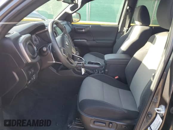 2023 Toyota Tacoma SR with VIN 3TMCZ5ANXPM559511, listed as a Copart auction lot 80508385 with 33,176 mi miles and Salvage title. Bid and sale history available at DreamBid. Image 7.