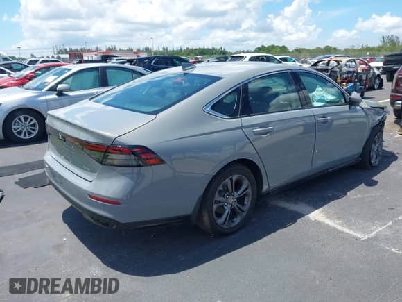 2025 Honda Accord EX-L with VIN 1HGCY2F66SA021933, listed as a IAAI auction lot 42978048 with 7,939 mi miles and . Bid and sale history available at DreamBid. Image 4.