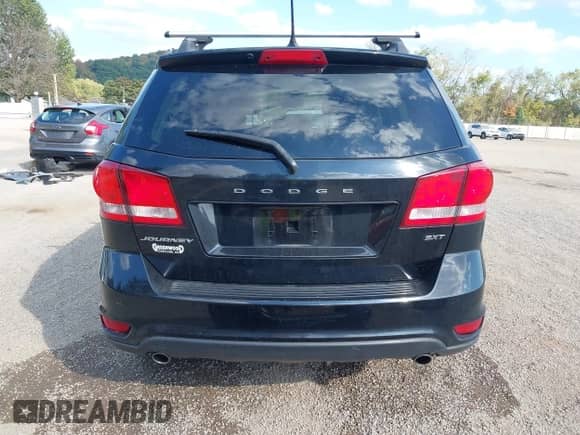 2014 Dodge Journey SXT with VIN 3C4PDCBG0ET141000, listed as a IAAI auction lot 43255379 with 199,750 mi miles and . Bid and sale history available at DreamBid. Image 16.