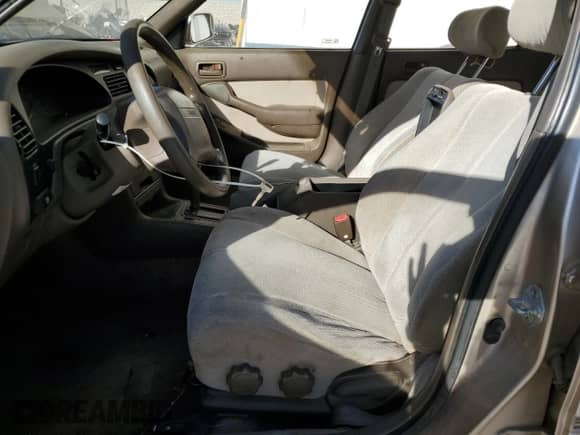 1995 Toyota Camry LE z VIN JT2GK12E9S0111987, wystawiony jako Copart lot #68873785 z przebiegiem 321 898 mil mil oraz Czysty tytuł • Clean title. Historia ofert i sprzedaży dostępna na DreamBid. Obrazek 7.