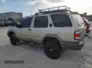 2001 Nissan Pathfinder LE с VIN JN8DR09X11W576142, выставлен на аукционе Copart как лот 67943555 с пробегом 134 328 миль миль и Списание • Salvage title. История ставок и продаж доступна на DreamBid. Изображение 2.