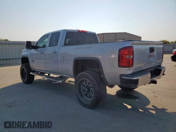 2014 GMC Sierra 1500 SLE z VIN 1GTV2UEC9EZ293975, wystawiony jako Copart lot #81319515 z przebiegiem 141 217 mil mil oraz Czysty tytuł • Clean title. Historia ofert i sprzedaży dostępna na DreamBid. Obrazek 2.