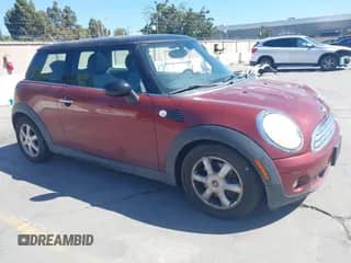 2009 MINI Hardtop with VIN WMWMF33549TW70426, listed as a IAAI auction lot 42910077 with 140,980 mi miles and . Bid and sale history available at DreamBid. Image 1.