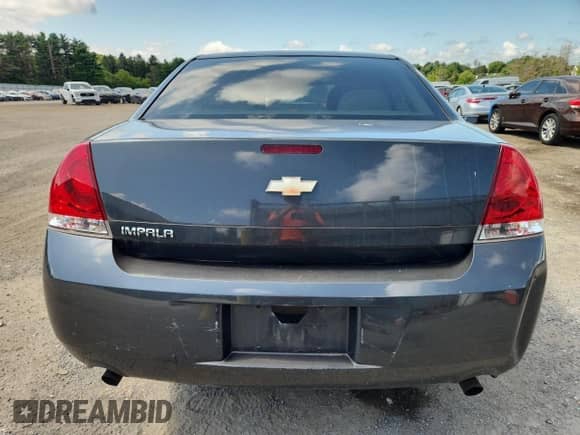 2013 Chevrolet Impala LS z VIN 2G1WF5E3XD1253287, wystawiony jako Copart lot #68584925 z przebiegiem 186 826 mil mil oraz Czysty tytuł • Clean title. Historia ofert i sprzedaży dostępna na DreamBid. Obrazek 6.