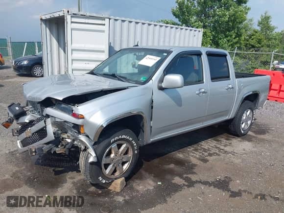 2011 Chevrolet Colorado 1LT z VIN 1GCHTCFEXB8131732, wystawiony jako IAAI lot #42595193 z przebiegiem 129 689 mil mil oraz . Historia ofert i sprzedaży dostępna na DreamBid. Obrazek 2.