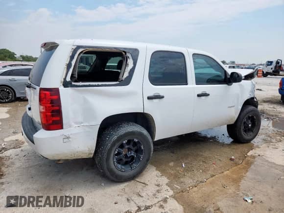 2010 Chevrolet Tahoe Commercial z VIN 1GNUKAE01AR285841, wystawiony jako Copart lot #70548475 z przebiegiem Nie podano mil oraz Szkoda całkowita • Salvage title. Historia ofert i sprzedaży dostępna na DreamBid. Obrazek 3.
