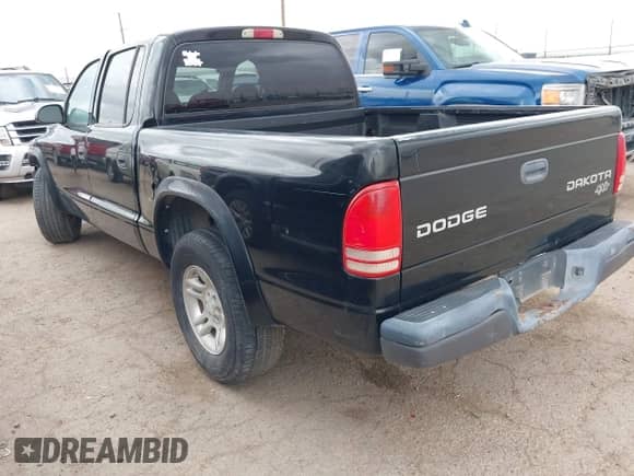 2004 Dodge Dakota Sport with VIN 1D7HL38K24S729571, listed as a IAAI auction lot 42392307 with 203,122 mi miles and . Bid and sale history available at DreamBid. Image 3.