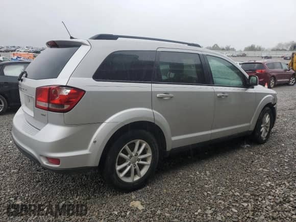 2014 Dodge Journey SXT with VIN 3C4PDCBB8ET180650, listed as a Copart auction lot 85146925 with 181,951 mi miles and Salvage title. Bid and sale history available at DreamBid. Image 3.