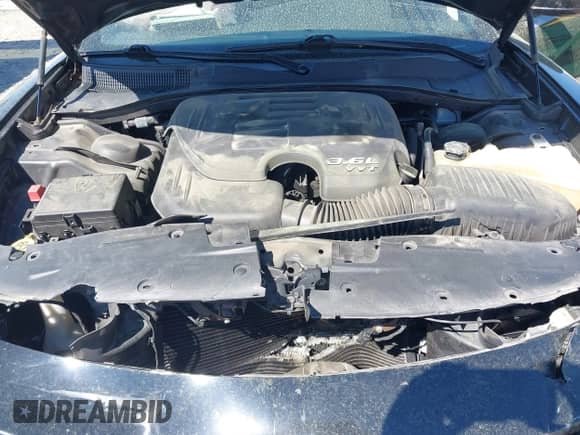 2016 Dodge Charger SE z VIN 2C3CDXFG4GH294267, wystawiony jako IAAI lot #41887393 z przebiegiem 117 649 mil mil oraz . Historia ofert i sprzedaży dostępna na DreamBid. Obrazek 10.