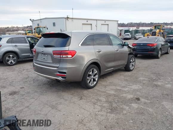 2018 Kia Sorento SX z VIN 5XYPKDA59JG366609, wystawiony jako IAAI lot #41090231 z przebiegiem 72 696 mil mil oraz . Historia ofert i sprzedaży dostępna na DreamBid. Obrazek 4.