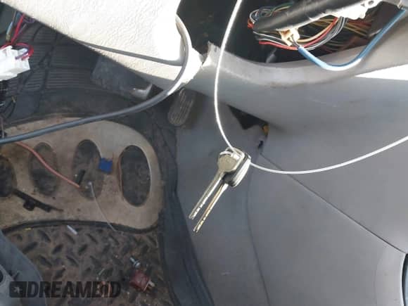 2003 Toyota Corolla CE z VIN JTDBR32E630042685, wystawiony jako IAAI lot #43409208 z przebiegiem Nie podano mil oraz . Historia ofert i sprzedaży dostępna na DreamBid. Obrazek 11.