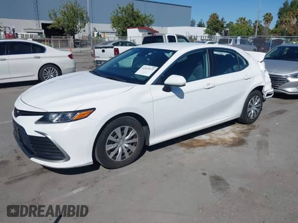 2022 Toyota Camry Hybrid LE with VIN 4T1C31AK4NU583386, listed as a IAAI auction lot 42532572 with 151,289 mi miles and . Bid and sale history available at DreamBid. Image 2.
