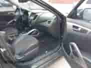 2012 Hyundai Veloster w/Black Int с VIN KMHTC6AD8CU066779, выставлен на аукционе IAAI как лот 41699960 с пробегом 160 875 миль миль и . История ставок и продаж доступна на DreamBid. Изображение 5.