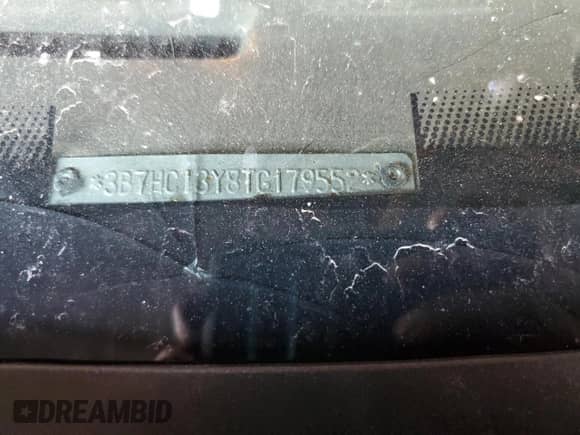 1996 Dodge 1500 z VIN 3B7HC13Y8TG179552, wystawiony jako Copart lot #90665965 z przebiegiem 127 706 mil mil oraz Szkoda całkowita • Salvage title. Historia ofert i sprzedaży dostępna na DreamBid. Obrazek 12.